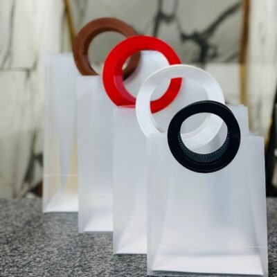 PVC ROUND HANDLED LEATHER STRAPPED BAGS BAGS